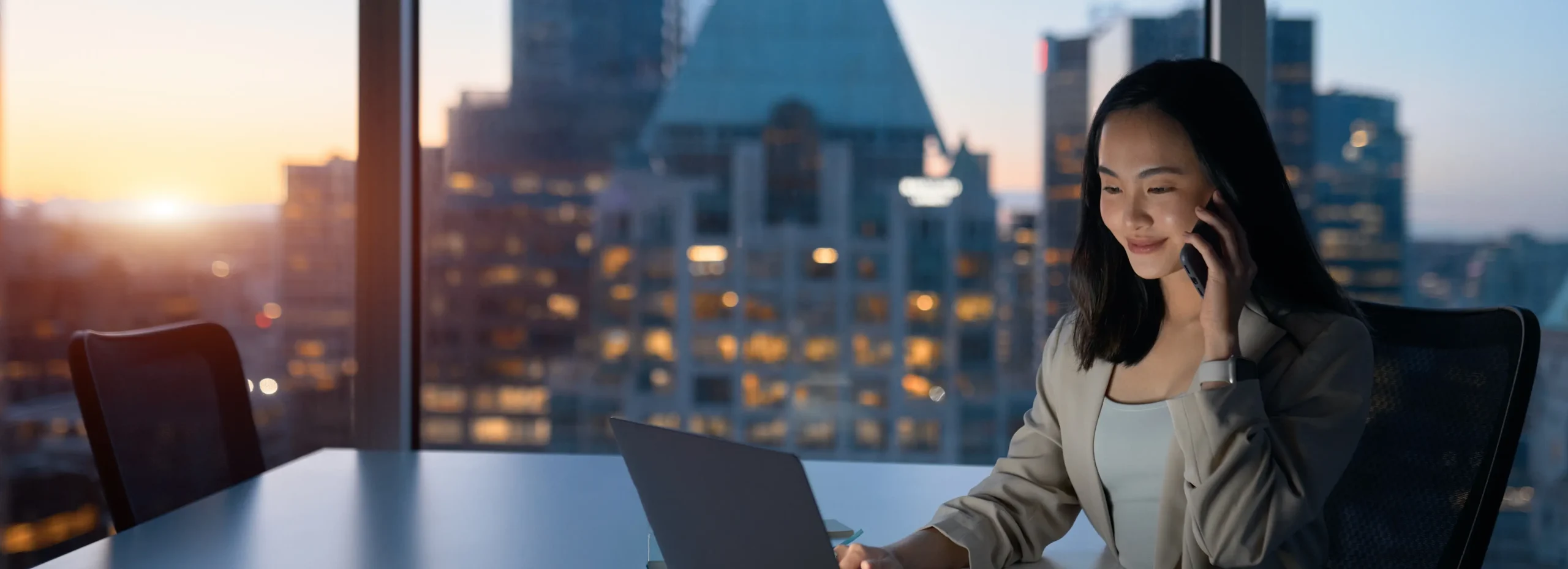 Business professional working on laptop to scrape Chinese web at large scale for e-commerce data and market research