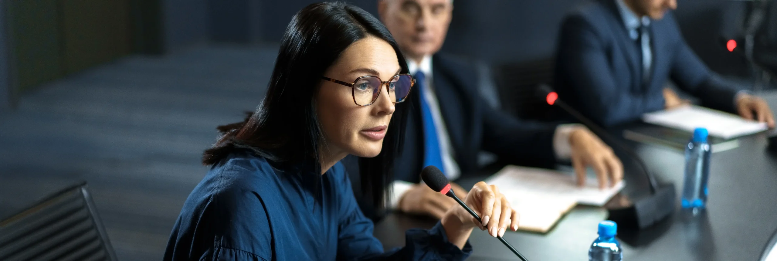 Government officials in meeting discussing big data in government for policy making and decision analysis