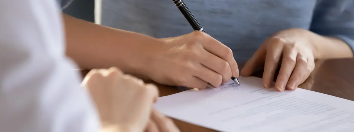 Large-scale web scraping - professional signing employment contract at recruitment meeting