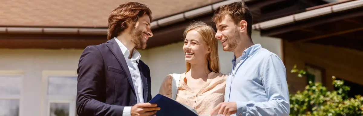 Real Estate Scraping: Agent showing property documents to couple outside home for market data analysis