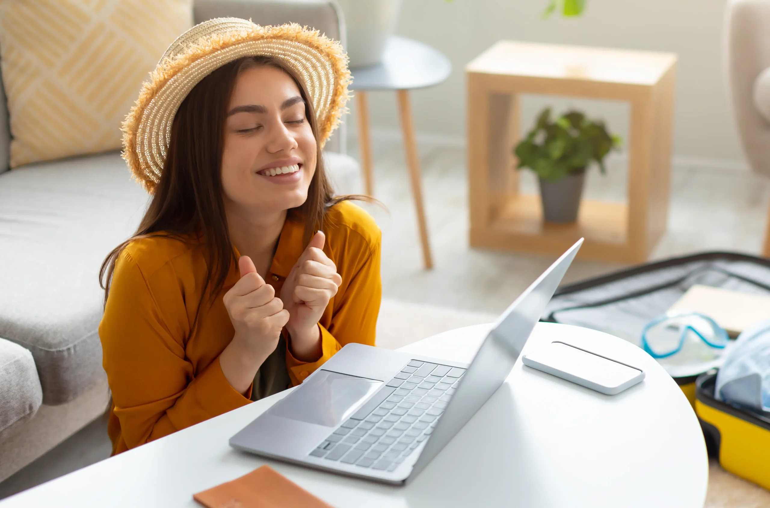 Excited-woman-using-notebook-for-data-scraping-1-scaled