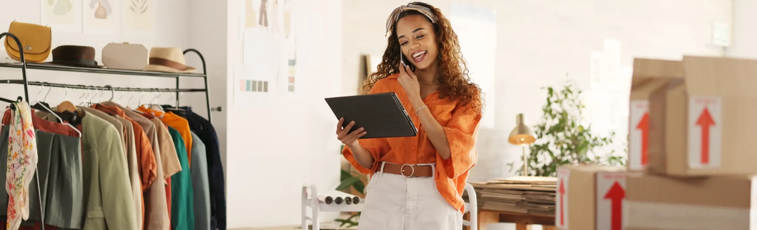 Small business owner using tablet to scrape Alibaba product data for global e-commerce supply chain research