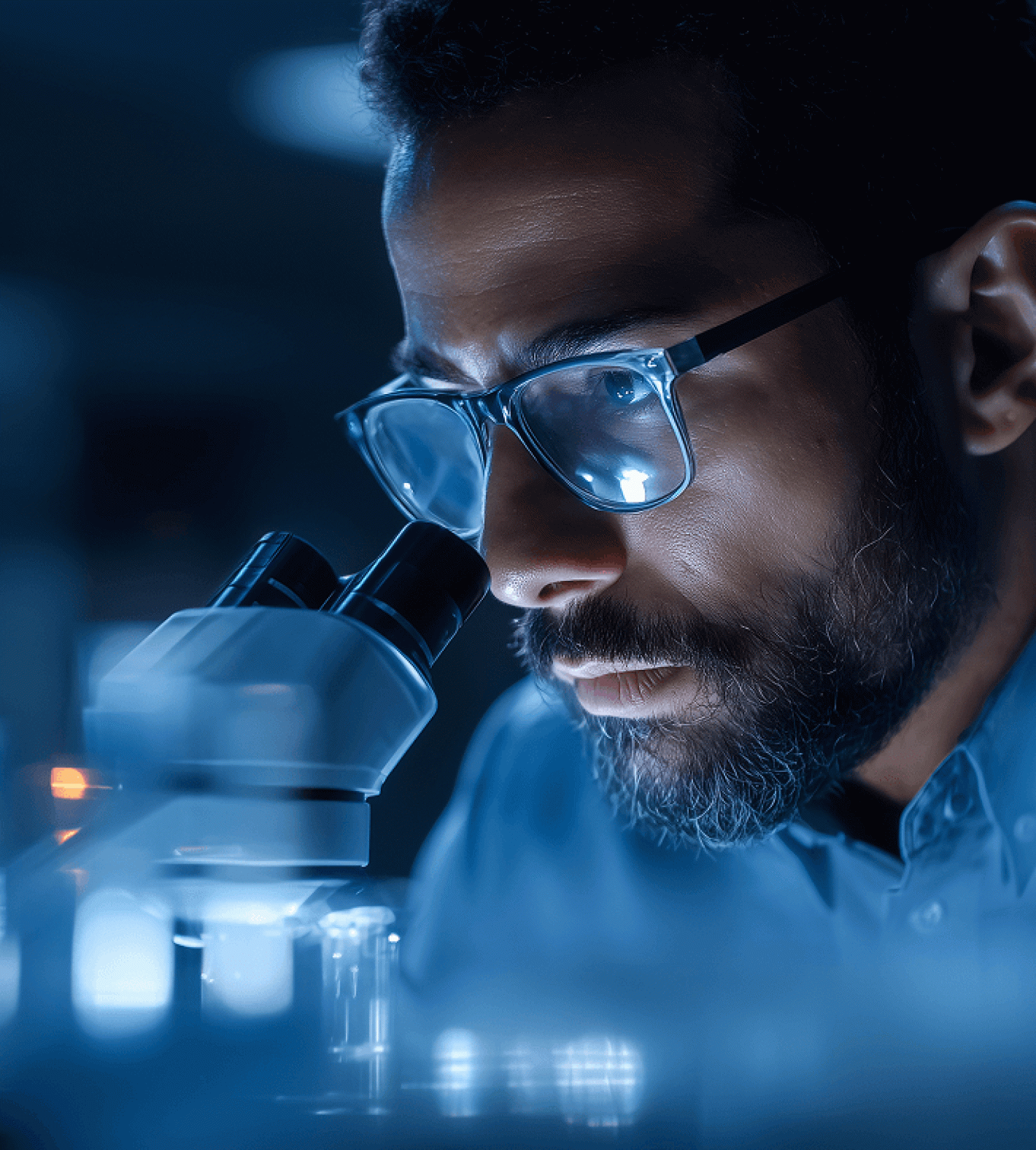 Scientist viewing samples under a microscope, healthcare data extraction.