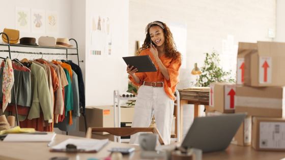 Small business owner using tablet to scrape