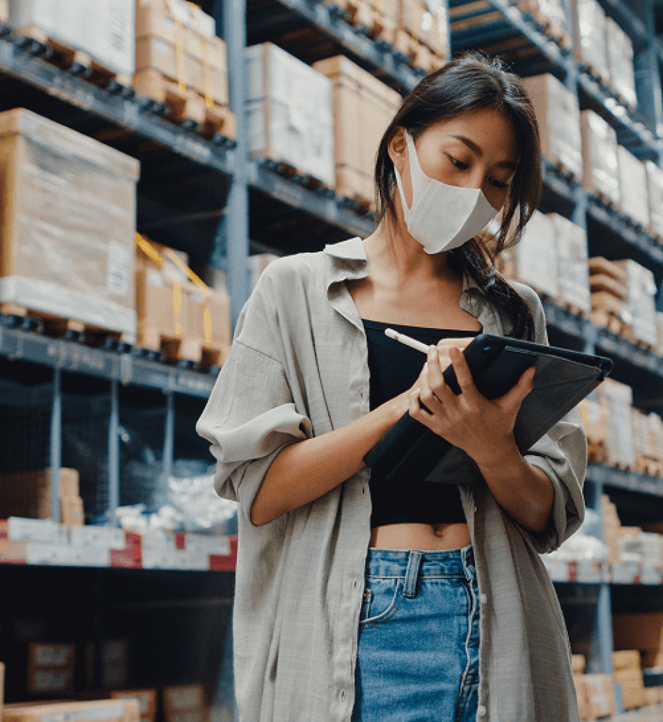 retail data scraping categories being noted on tablet by woman