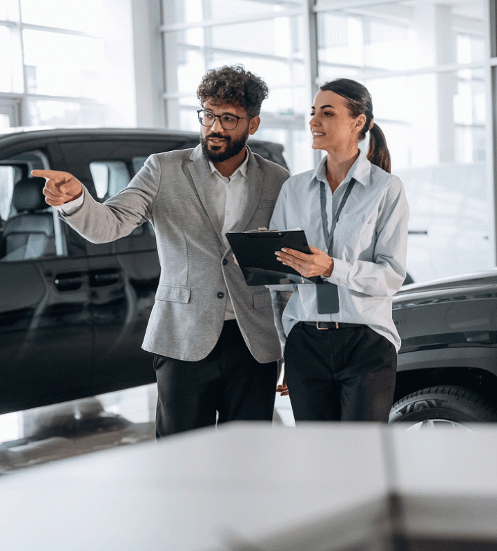 Business analysts discussing retail data scraping results