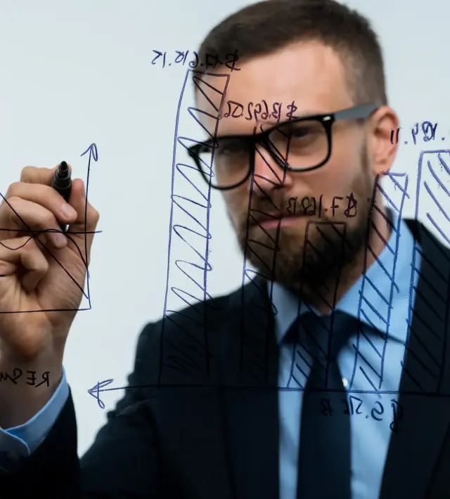 Pricing intelligence analysts reviewing competitor pricing data across market dashboards